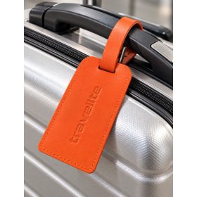 Travelite narancssárga bőr bőröndcímke