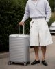 Travelite Next M ezüst 4 kerekű közepes méretű bőrönd 