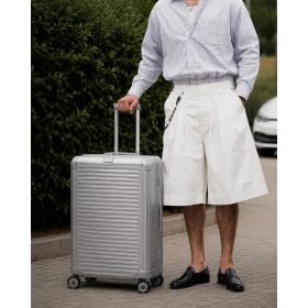 Travelite Next M ezüst 4 kerekű közepes méretű bőrönd 