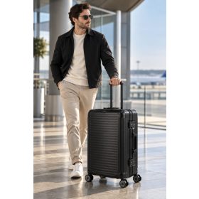   Travelite Next M fekete közepes méretű prémium alumínium bőrönd 