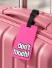 Travelite pink bőröndcímke dont touch