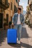 Travelite Pacific M 4w kék közepes bőrönd